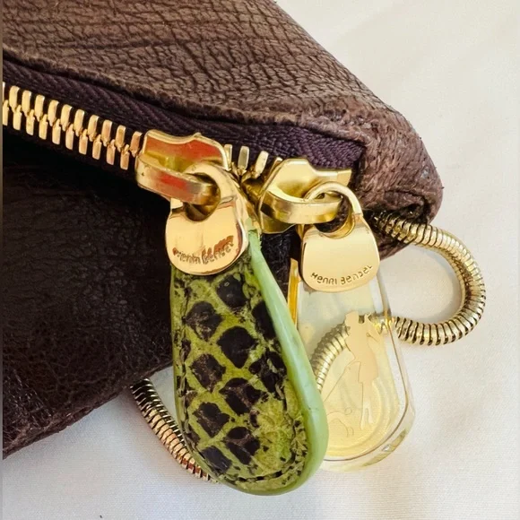Henri Bendel leather fold over asymmetrical slim clutch